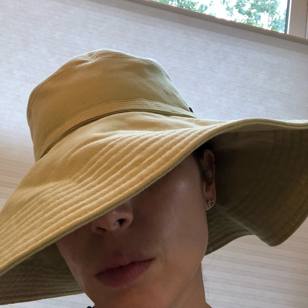 Pale green wide brim Helen Kaminski floppy hat